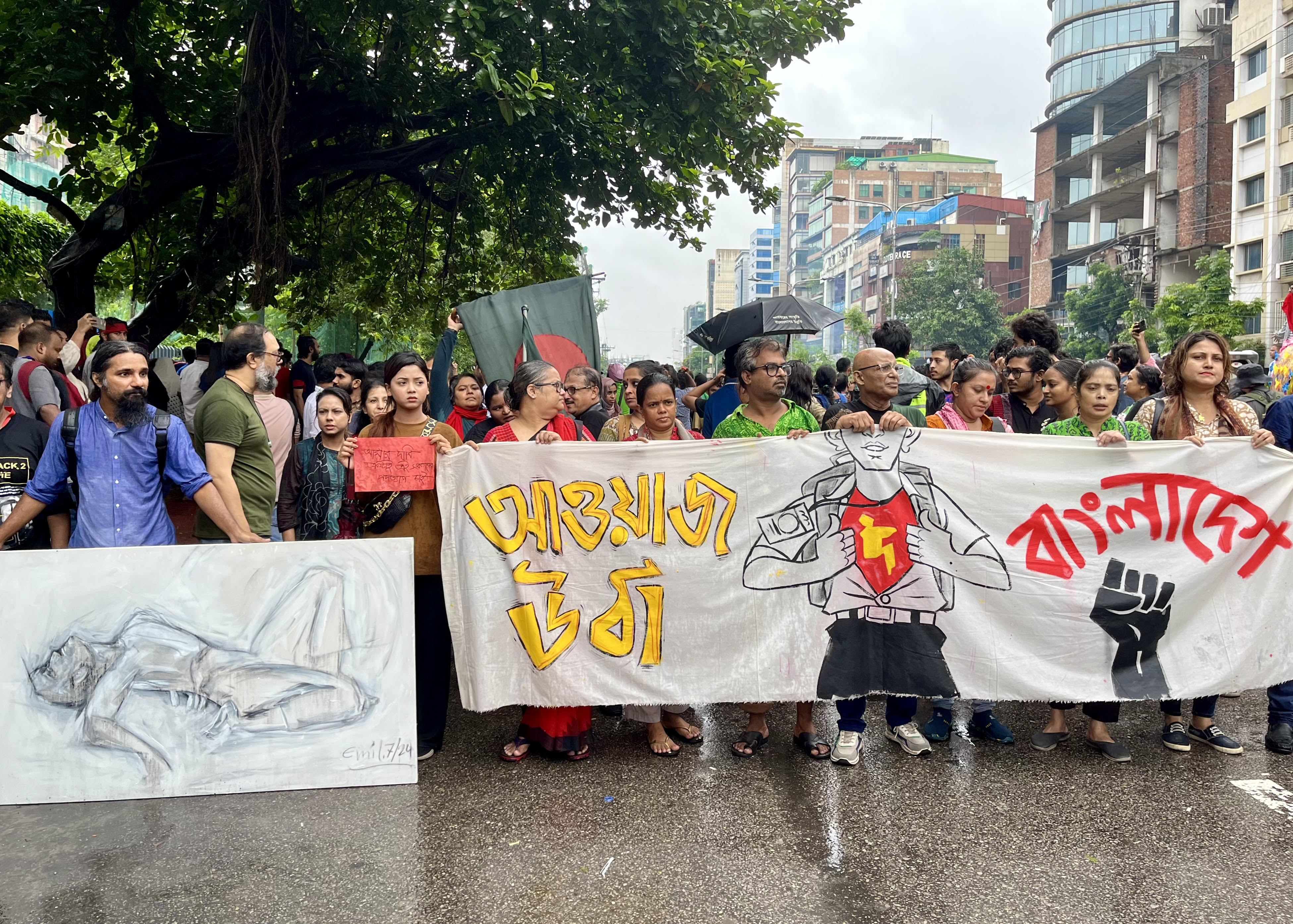 Brushes and banners: Creative community leads rainy revolt in Dhaka