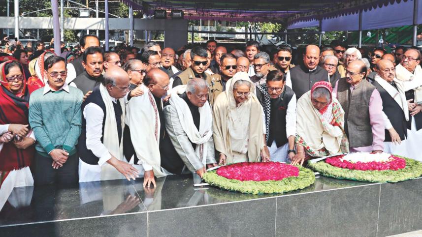 Flanked by senior Awami League leaders