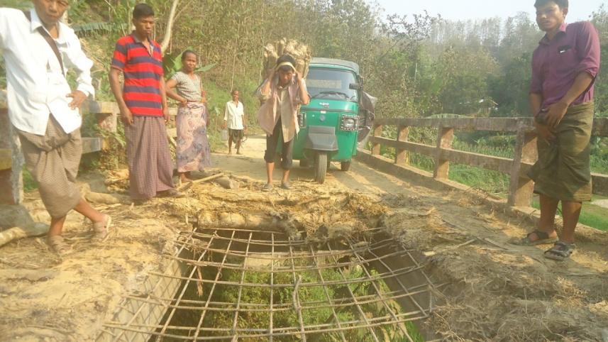 Broken bridge woes Bandarban.jpg