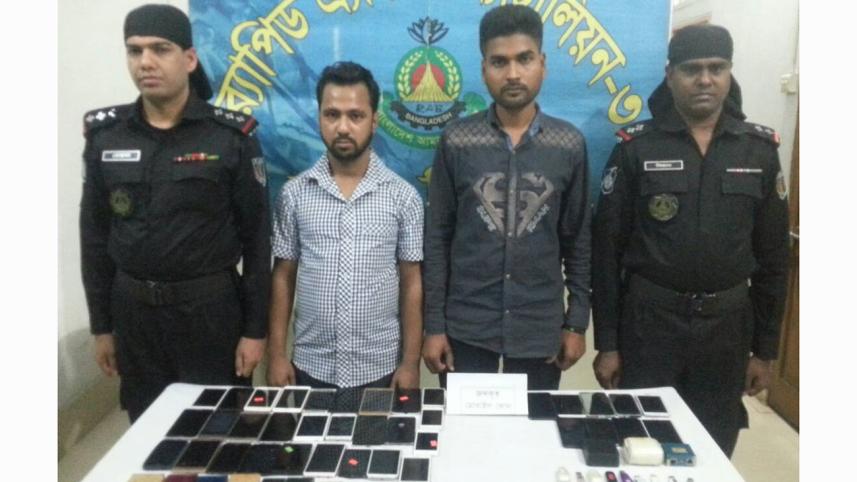 2 held with 37 stolen phones, IMEI changing devices in Gulistan