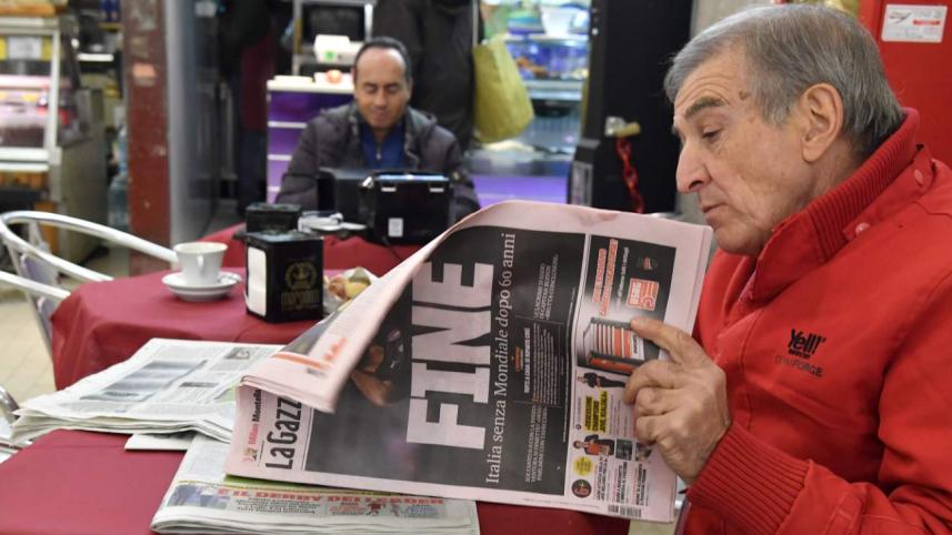 A man reads Italian sport newspaper