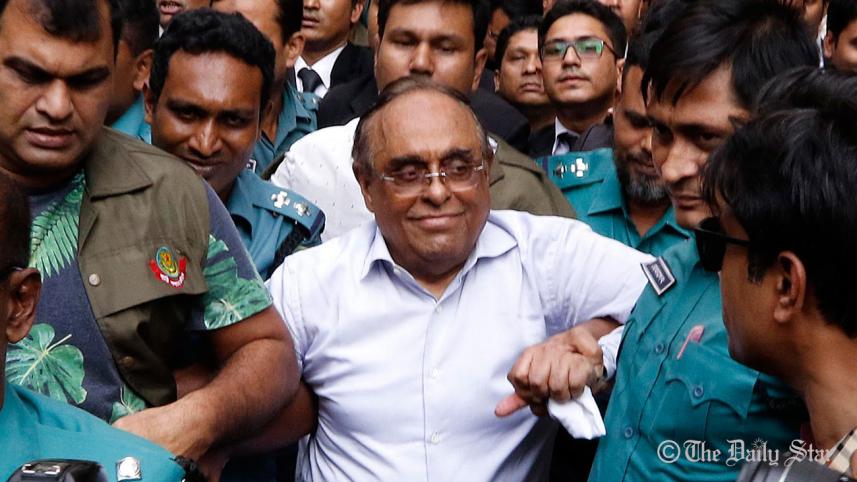Police escorting Barrister Mainul Hosein to Chief Metropolitan Magistrate Court