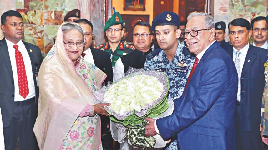 president greets hasina.jpg