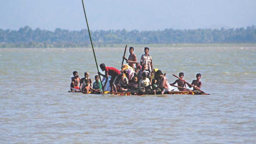 Rohingyas floating on makeshift...