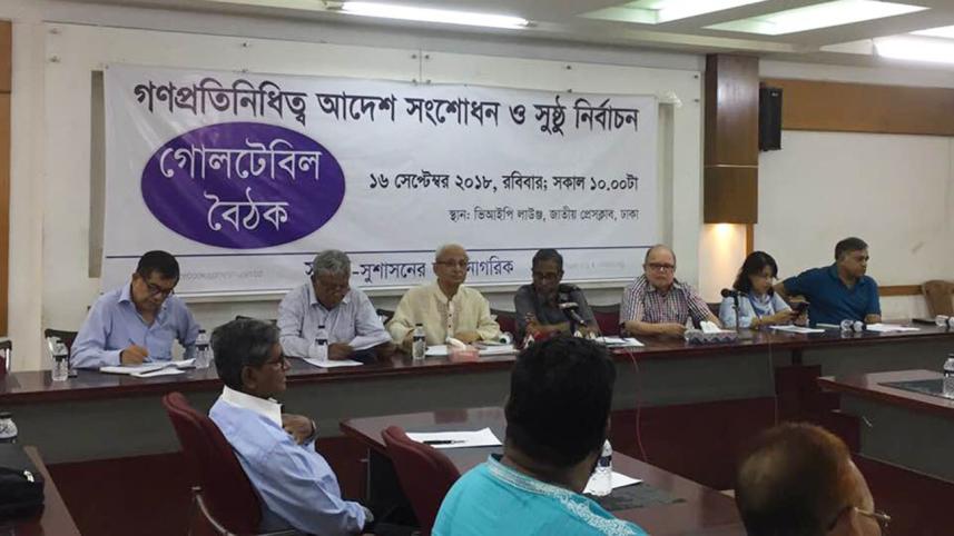Shujan President M Hafizuddin Khan speaks at a roundtable meeting 
