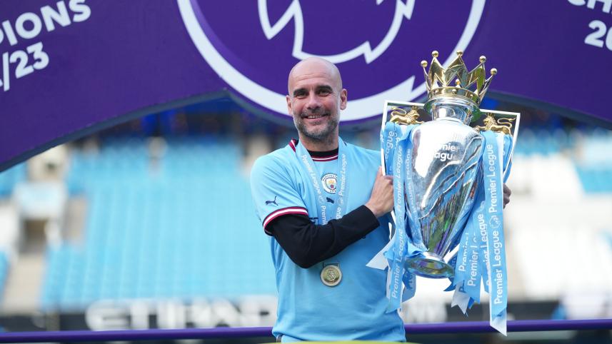 Pep Guardiola with PL trophy 
