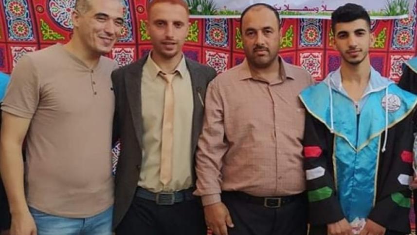 Ibrahim Saleem Kishko with his uncle and relatives