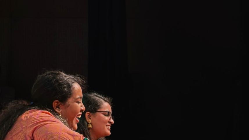 teenage sisters playing classical sarod in Dhaka