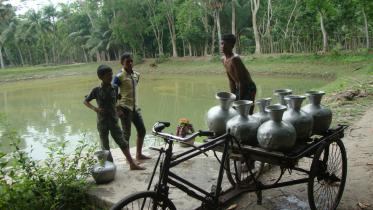 Boys collect water.jpg