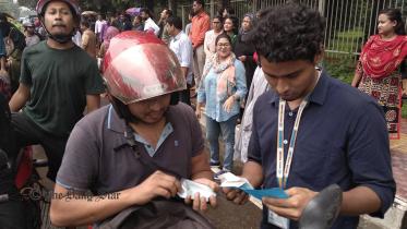 Students checking driving licenses