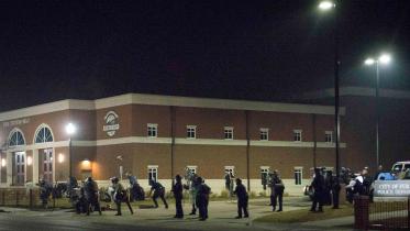 Ferguson-Cops-stand-guard--2NEWB.jpg