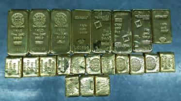 Indian citizen held with 12 kg gold bars