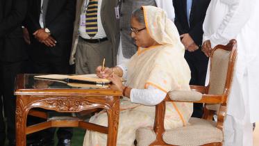 Hasina-deal-signing-web.jpg