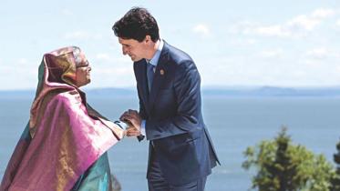 Prime Minister Sheikh Hasina is greeted by Canadian Prime Minister Justin Trudeau