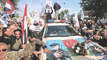 mourn slain Iran commander.jpg