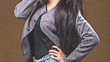 Dhaliwood Actress Pori Moni become producer of Shonar Tori