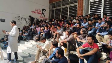 DU teacher takes class in staircases