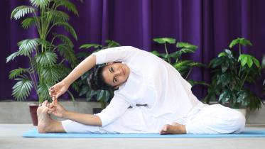 Tired of sucking in your belly? Try these yoga moves to shrink it for real