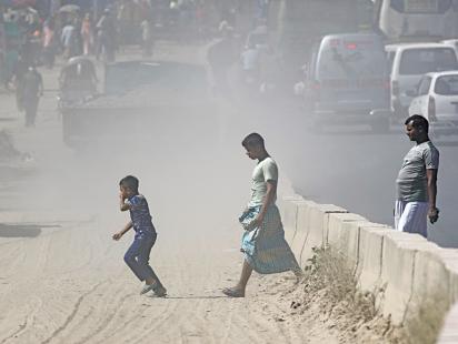 dust kicked up by vehicles